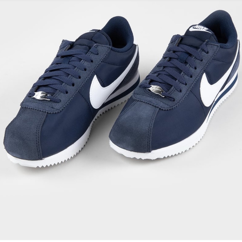 Like new Nike Cortez suede and nylon sneaker.